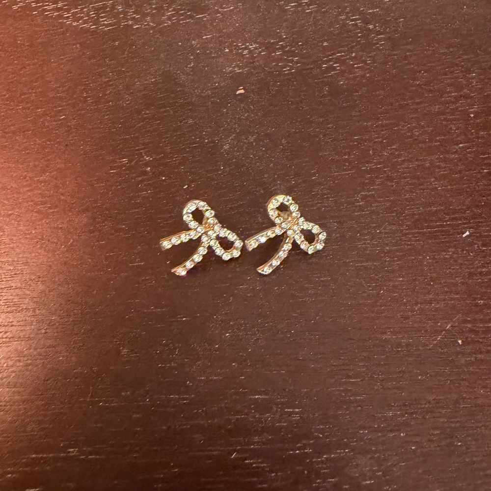 Crystal Bow Stud Earrings in Silver Tone